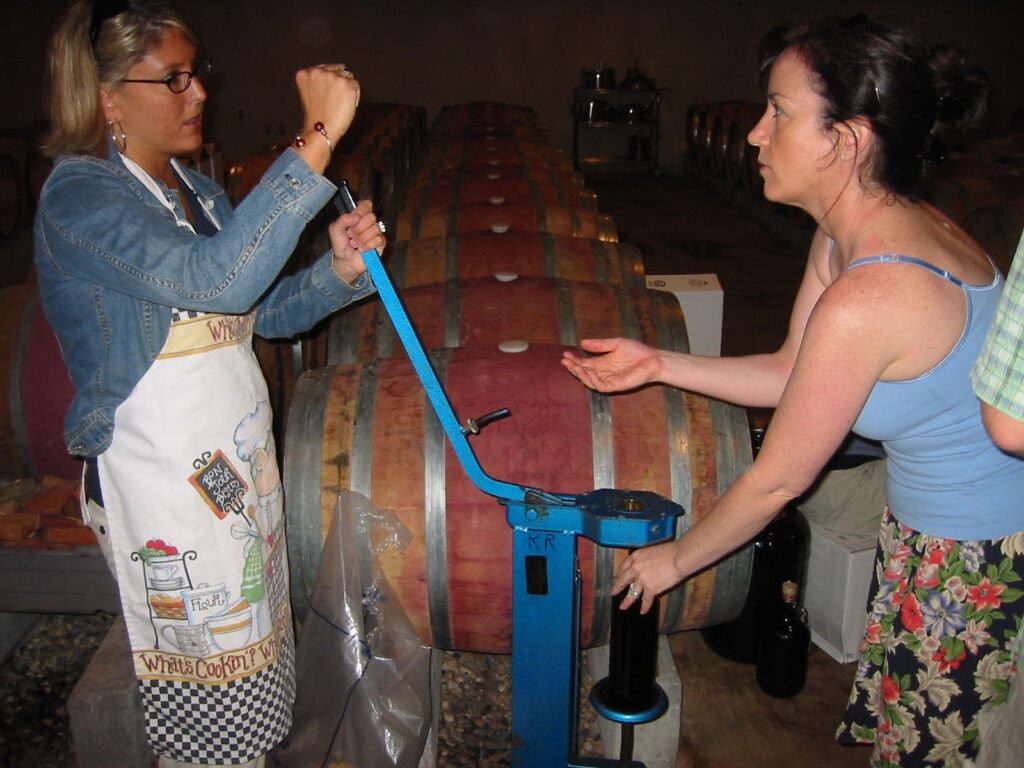 group of people bottling wine