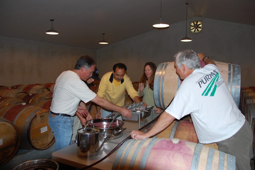 group of people bottling wine