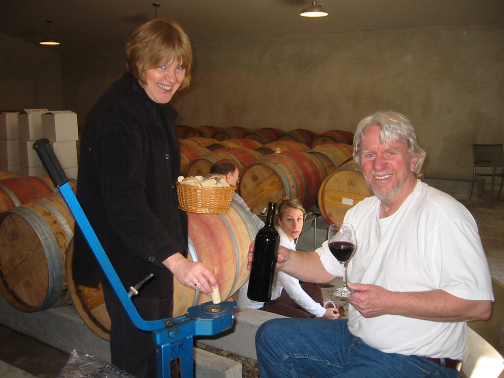 group of people bottling wine