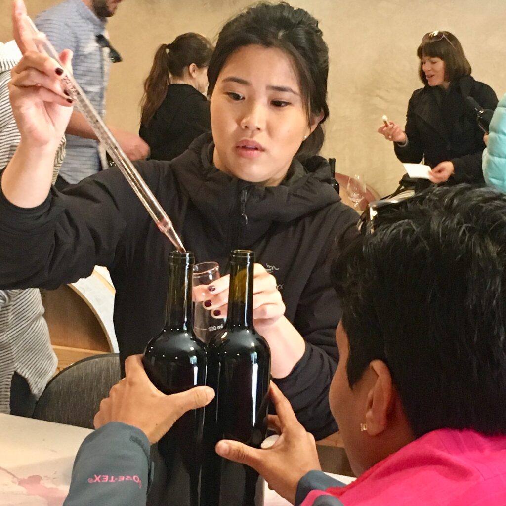 group of people bottling wine